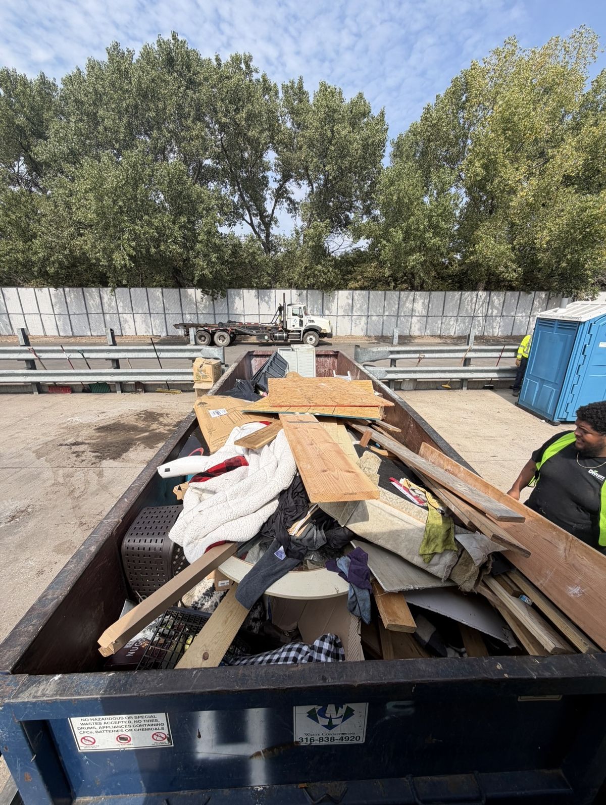 A full load being unloaded for proper disposal